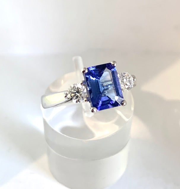 18CT EMERALD CUT TANZANITE & DIAMOND RING