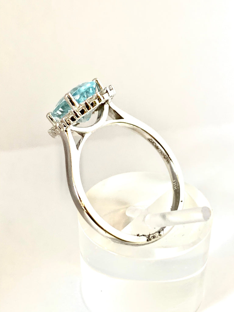 18CT AQUAMARINE & DIAMOND HALO RING