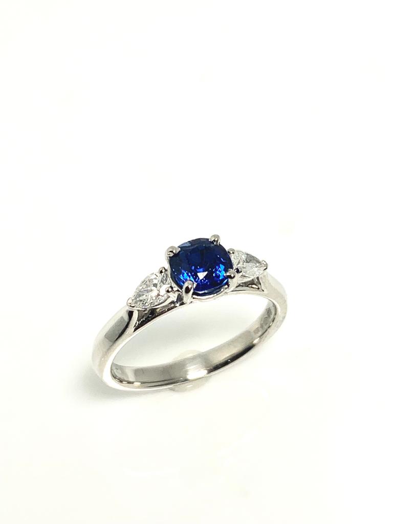 ROYAL BLUE SAPPHIRE AND PEAR CUT DIAMOND RING