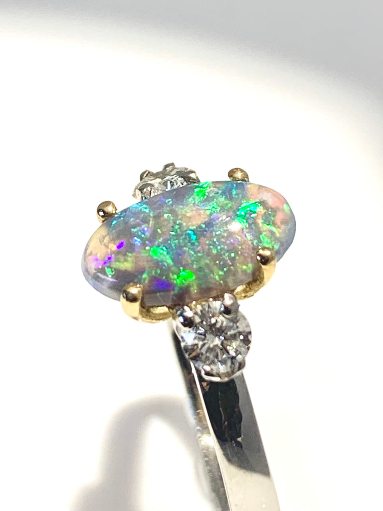 LIGHTNING RIDGE BLACK OPAL AND DIAMOND PLATINUM RING