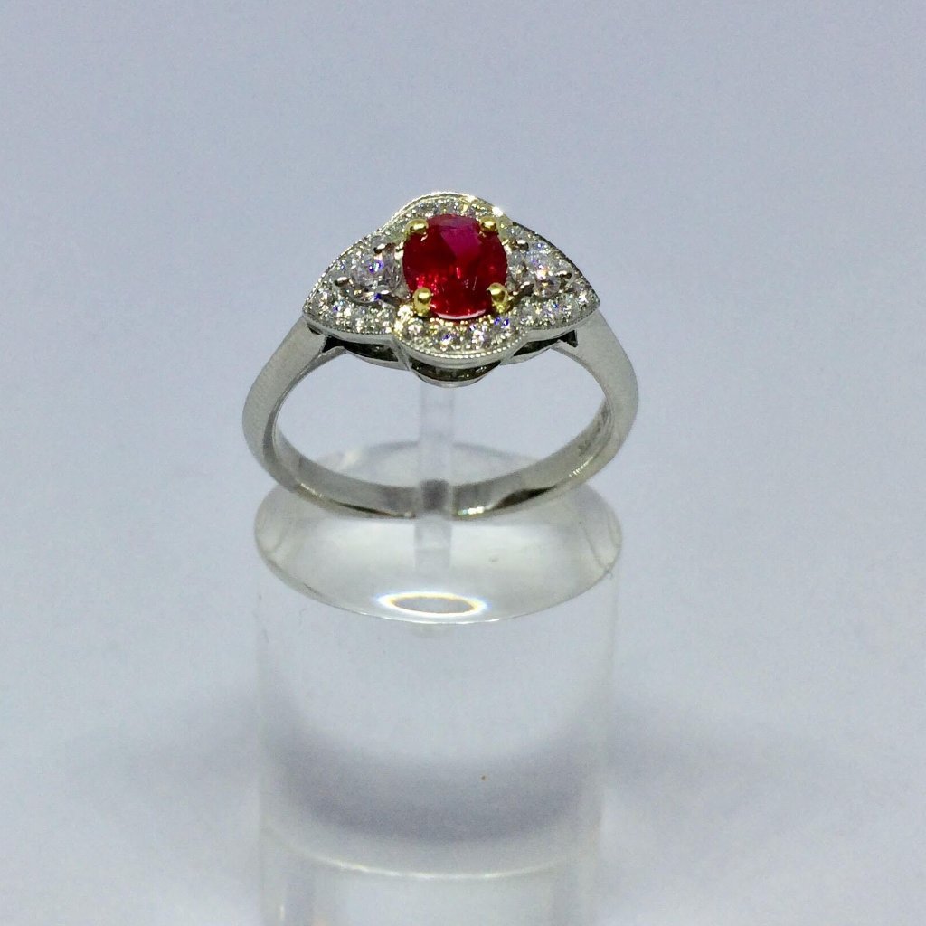 PLATINUM RUBY DIAMOND OVAL CLUSTER RING