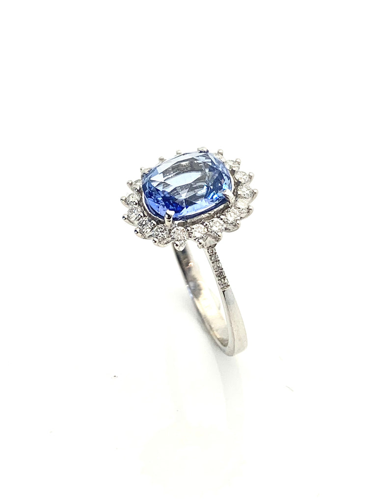 NATURAL SAPPHIRE AND DIAMOND HALO RING