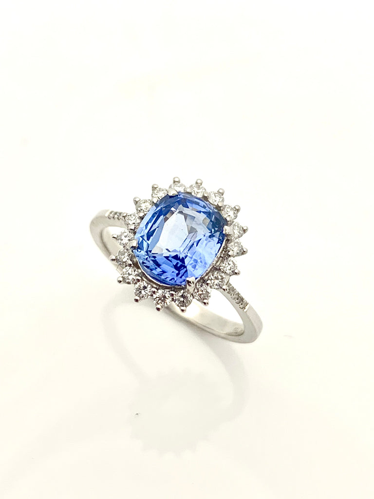 NATURAL SAPPHIRE AND DIAMOND HALO RING